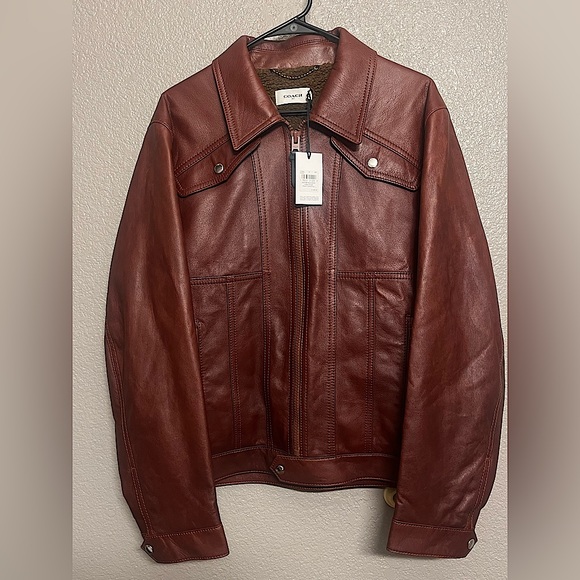 I am selling my COACH jacket. Never worn. Size Large.